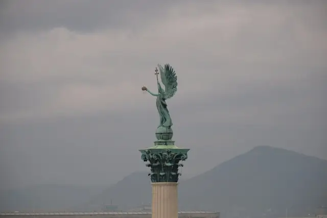 Statue of the Archangel Gabriel at the top of the Millennium Monument.