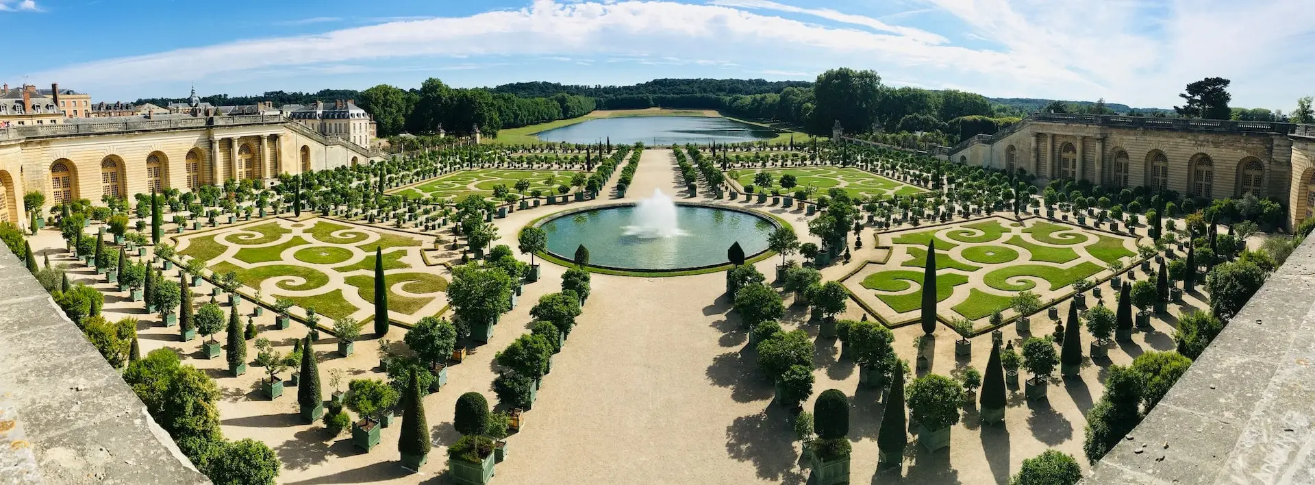The enchanting gardens of the Palace of Versailles.